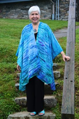 Teacher Sue Mitchell-Wallace wearing water serape
