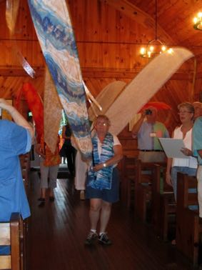 Processing with banners in Kanuga Chapel