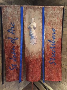 Silk banner for St Joan of Arc parish
to be used at the annual diocesan Chrism mass.
All churches in their deanery had to use rust